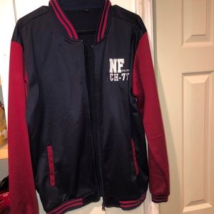 Burgundy and dark blue zip up jacket